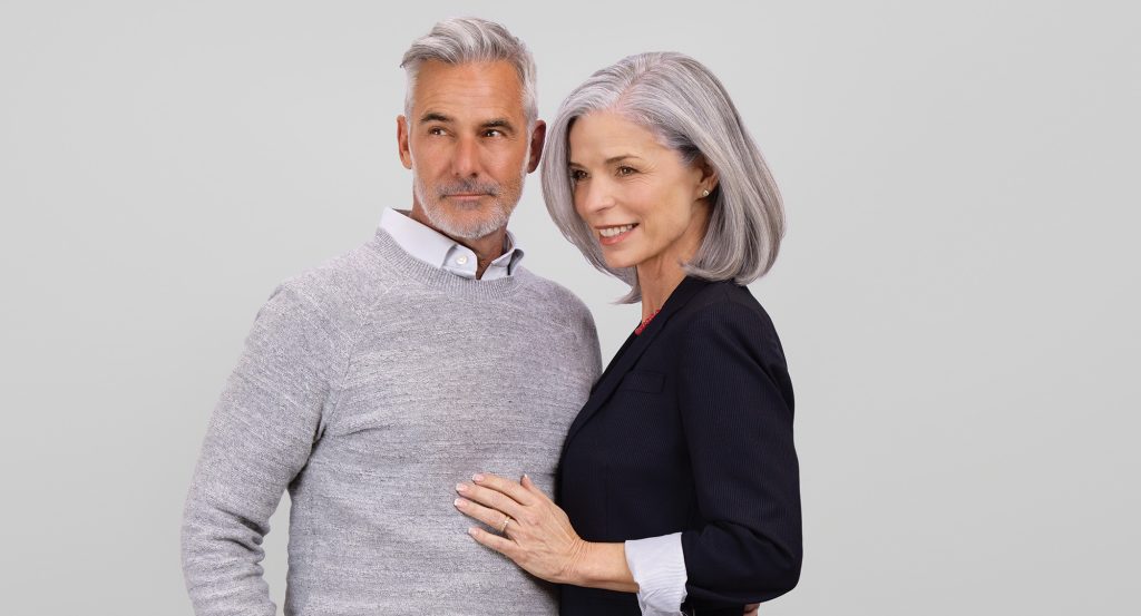 Older couple posing for photo